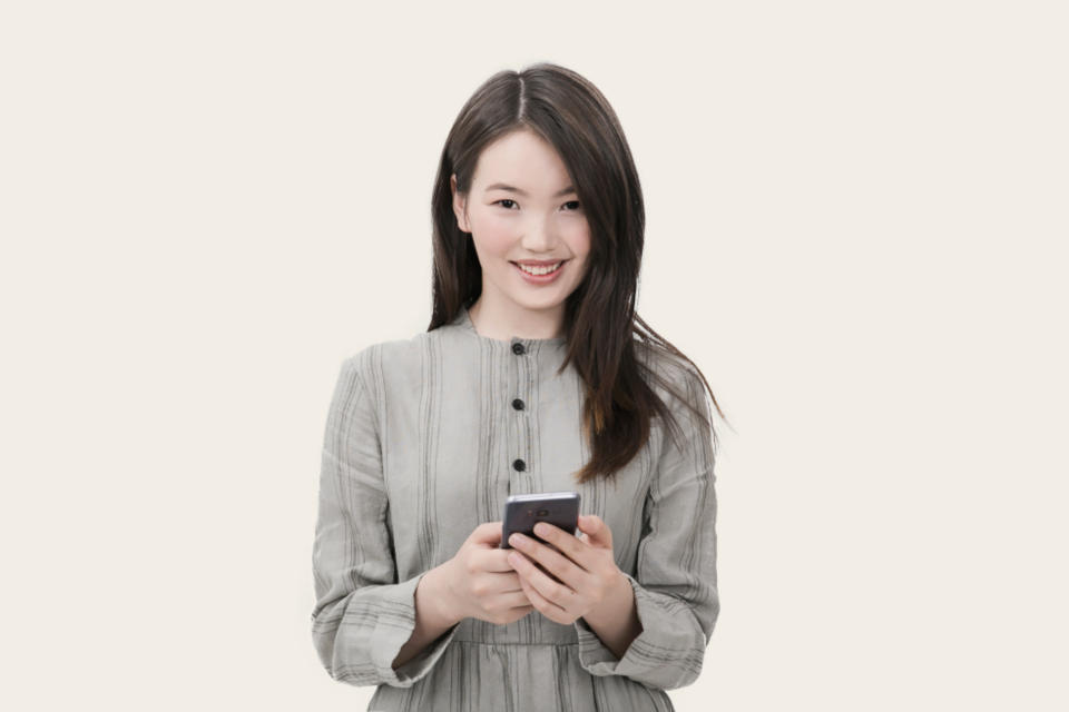 Woman comparing personal loan offers on her phone